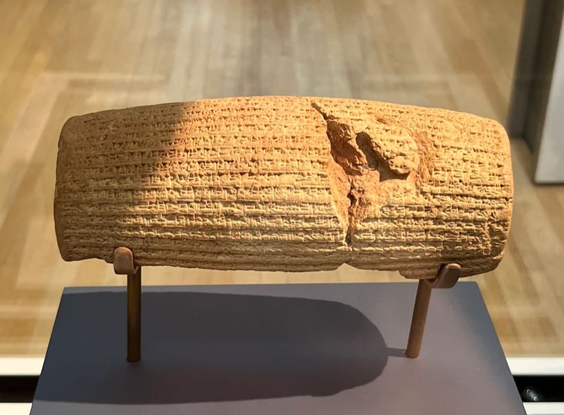 The Cyrus Cylinder, an ancient clay cylinder inscribed in cuneiform, held at the British Museum